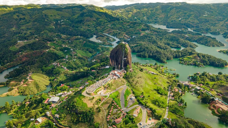 El Peñol rising above the flooded valley and its islands at Guatapé, from the air