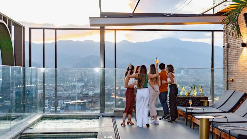 A rooftop in Medellín at sunset, looking over the valley
