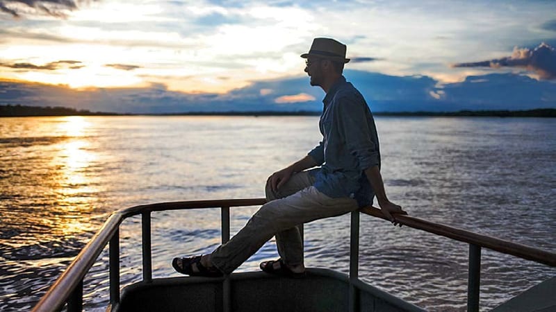 Dusk on the river, from the boat — Amazon, Peru — photograph by Trip360, our Peru operator